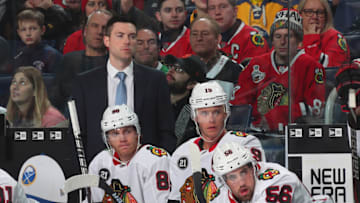 BUFFALO, NY - FEBRUARY 1: Head coach Jeremy Colliton of the Chicago Blackhawks watches the action standing behind Patrick Kane #88 and Jonathan Toews #19 during an NHL game against the Buffalo Sabres on February 1, 2019 at KeyBank Center in Buffalo, New York. (Photo by Bill Wippert/NHLI via Getty Images)