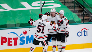 Ian Mitchell #51, Brandon Hagel #38, Pius Suter #24, Chicago Blackhawks (Photo by Tom Pennington/Getty Images)