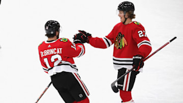 Chicago Blackhawks, Alex DeBrincat #12, Adam Boqvist #27 (Photo by Jonathan Daniel/Getty Images)
