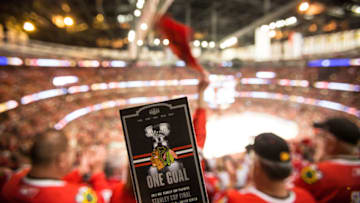CHICAGO, IL - JUNE 10: A ticket for Game Four of the 2015 NHL Stanley Cup Final between the Chicago Blackhawks and the Tampa Bay Lightning is held up in the bowl at the United Center after the Blackhawks defeated the Lightning 2-1 on June 10, 2015 in Chicago, Illinois. (Photo by Bill Smith/NHLI via Getty Images)