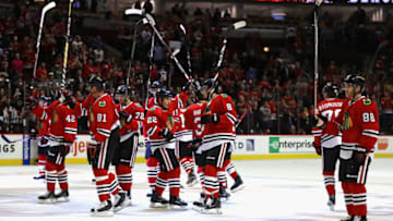 CHICAGO, IL - NOVEMBER 03: Members of the Chicago Blackhawks salute the crowd after a win over the Colorado Avalanche at the United Center on November 3, 2016 in Chicago, Illinois. The Blackhawks defeated the Avalanche 4-0. (Photo by Jonathan Daniel/Getty Images)