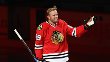 CHICAGO, IL - OCTOBER 05: Former player Brian Bickell of the Chicago Blackhawks, who signed a one day contract to retire as a member of the Blackhawks, sheds a tear as he waves to the crowd before the season opening game against the Pittsburgh Penguins at the United Center on October 5, 2017 in Chicago, Illinois. (Photo by Jonathan Daniel/Getty Images)