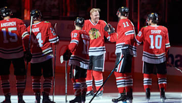 CHICAGO, IL - OCTOBER 05: Former Chicago Blackhawks player Brian Bickell, who signed a one day contract to retire as a member of the Blackhawks, skates the ice as he waves to the crowd and is greeted by the Chicago Blackhawks players ad staff before the season opening game against the Pittsburgh Penguins at the United Center on October 5, 2017 in Chicago, Illinois. (Photo by Robin Alam/Icon Sportswire via Getty Images)