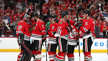 CHICAGO, IL - OCTOBER 07: The Chicago Blackhawks celebrate after defeating the Columbus Blue Jackets 5-1 at the United Center on October 7, 2017 in Chicago, Illinois. (Photo by Bill Smith/NHLI via Getty Images)