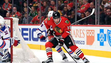 CHICAGO, IL - DECEMBER 09: Chicago Blackhawks center Artem Anisimov (15) battles with New York Rangers defenseman Marc Staal (18) behind the net during the second period of an NHL game between the New York Rangers and the Chicago Blackhawks on December 9, 2016, at the United Center in Chicago, IL. The New York Rangers defeated the Chicago Blackhawks 1-0 in overtime. (Photo by Robin Alam/Icon Sportswire via Getty Images)
