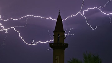 A picture shows a thunderstorm in the Libyan capital Tripoli on September 27, 2017. / AFP PHOTO / MAHMUD TURKIA (Photo credit should read MAHMUD TURKIA/AFP/Getty Images)