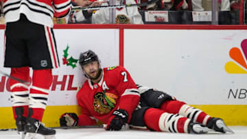 Chicago Blackhawks defenseman Brent Seabrook (7) lays on the ice after being hooked by Los Angeles Kings right wing Marian Gaborik (12) during the first period on Sunday, Dec. 3, 2017, at the United Center in Chicago, Ill. (Erin Hooley/Chicago Tribune/TNS via Getty Images)