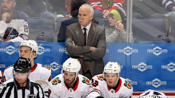 WINNIPEG, MB - DECEMBER 14: Head Coach Joel Quenneville of the Chicago Blackhawks looks on from the bench during second period action against the Winnipeg Jets at the Bell MTS Place on December 14, 2017 in Winnipeg, Manitoba, Canada. (Photo by Jonathan Kozub/NHLI via Getty Images)