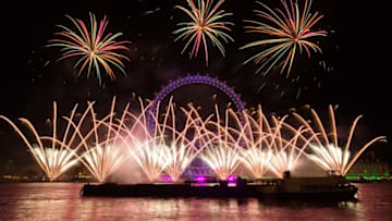LONDON, UNITED KINGDOM - JANUARY 01: Fireworks light up the sky above the London Eye during the new year celebrations in London, United Kingdom on January 01, 2018. (Photo by Vickie Flores/Anadolu Agency/Getty Images)