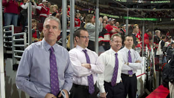 CHICAGO - OCTOBER 20: Chicago Blackhawks Assistant Coaches Mike Haviland, Tim Campbell, Mike Kitchen, and Stephane Waite wear lavender ties in honor of Hockey Fights Cancer night during the game against the Vancouver Canucks on October 20, 2010 at the United Center in Chicago, Illinois. (Photo by Bill Smith/NHLI via Getty Images)