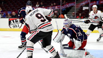 CLEVELAND, OH - JANUARY 17: The shot of Rockford IceHogs left wing Matthew Highmore (9) deflects off the pads of Cleveland Monsters goalie Matiss Kivlenieks (35) during the third period of the American Hockey League game between the Rockford IceHogs and Cleveland Monsters on January 17, 2018, at Quicken Loans Arena in Cleveland, OH. Cleveland defeated Rockford 4-3 in a shootout. (Photo by Frank Jansky/Icon Sportswire via Getty Images)
