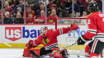 CHICAGO, IL - MARCH 29: Chicago Blackhawks goalie Collin Delia (60) cannot stop the shot of Winnipeg Jets center Mark Scheifele (55) in the 2nd period during an NHL hockey game between the Winnipeg Jets and the Chicago Blackhawks on March 29, 2018, at the United Center in Chicago, IL. (Photo By Daniel Bartel/Icon Sportswire via Getty Images)