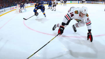ST. LOUIS, MO - APRIL 4: Victor Ejdsell #14 of the Chicago Blackhawks attempts to control the puck against the St. Louis Blues at Scottrade Center on April 4, 2018 in St. Louis, Missouri. (Photo by Dilip Vishwanat/NHLI via Getty Images)