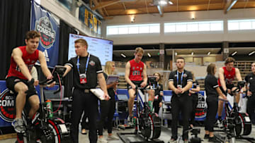 BUFFALO, NY - JUNE 1: Brayden Tracey, Alex Vlasic and Moritz Seider (L-R) prepare to perform the Wingate Cycle test during the 2019 NHL Scouting Combine on June 1, 2019 at Harborcenter in Buffalo, New York. (Photo by Bill Wippert/NHLI via Getty Images)