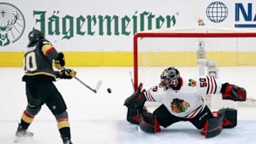 EDMONTON, ALBERTA - AUGUST 18: Chandler Stephenson #20 of the Vegas Golden Knights is stopped by Corey Crawford #50 of the Chicago Blackhawks during the second period in Game Five of the Western Conference First Round during the 2020 NHL Stanley Cup Playoffs at Rogers Place on August 18, 2020 in Edmonton, Alberta, Canada.