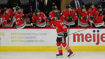 CHICAGO, ILLINOIS - FEBRUARY 13: Nicolas Beaudin #74 of the Chicago Blackhawks celebrates a goal with teammates during the second period against the Columbus Blue Jackets at the United Center on February 13, 2021 in Chicago, Illinois. (Photo by Stacy Revere/Getty Images)