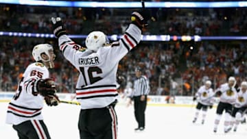 ANAHEIM, CA - MAY 19: Marcus Kruger #16 of the Chicago Blackhawks celebrates scoring the game winning goal over the Anaheim Ducks in triple overtime of Game Two of the Western Conference Finals during the 2015 NHL Stanley Cup Playoffs at Honda Center on May 19, 2015 in Anaheim, California. The Chicago Blackhawks won the game 3-2. (Photo by Stephen Dunn/Getty Images)