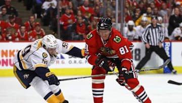 CHICAGO, IL - APRIL 15: Marian Hossa #81 of the Chicago Blackhawks moves to shoot under pressure from Roman Josi #59 of the Nashville Predators in Game Two of the Western Conference First Round during the 2017 NHL Stanley Cup Playoffs at the United Center on April 15, 2017 in Chicago, Illinois. The Predators defeated the Blackhawks 5-0. (Photo by Jonathan Daniel/Getty Images)