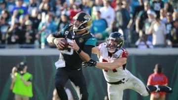 Dec 20, 2015; Jacksonville, FL, USA; Atlanta Falcons outside linebacker Kroy Biermann (71) pressures Jacksonville Jaguars quarterback Blake Bortles (5) during the second half at EverBank Field. Atlanta defeated Jacksonville 23-17. Mandatory Credit: Kim Klement-USA TODAY Sports