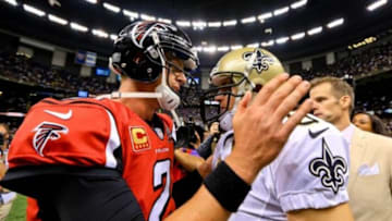 Oct 15, 2015; New Orleans, LA, USA; New Orleans Saints quarterback Drew Brees (9) talks to Atlanta Falcons quarterback Matt Ryan (2) following a win in a game at the Mercedes-Benz Superdome. The Saints defeated the Falcons 31-21. Mandatory Credit: Derick E. Hingle-USA TODAY Sports