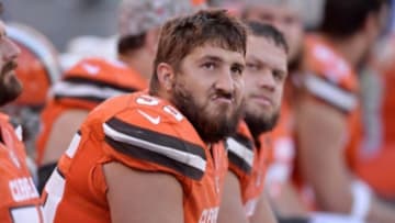 Nov 1, 2015; Cleveland, OH, USA; Cleveland Browns center Alex Mack (55) and guard Joel Bitonio (75) sit on the bench during the fourth quarter against the Arizona Cardinals at FirstEnergy Stadium. The Cardinals won 34-20. Mandatory Credit: Ken Blaze-USA TODAY Sports