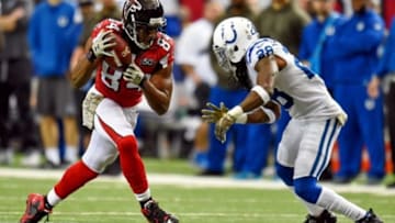 Nov 22, 2015; Atlanta, GA, USA; Atlanta Falcons wide receiver Roddy White (84) makes a catch in front of Indianapolis Colts cornerback Greg Toler (28) during the first half at the Georgia Dome. Mandatory Credit: Dale Zanine-USA TODAY Sports
