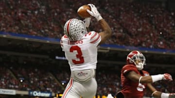 Jan 1, 2015; New Orleans, LA, USA; Ohio State Buckeyes receiver Michael Thomas (3) catches a second quarter touchdown pass against Alabama Crimson Tide cornerback Cyrus Jones (5) in the 2015 Sugar Bowl at Mercedes-Benz Superdome. Mandatory Credit: Matthew Emmons-USA TODAY Sports