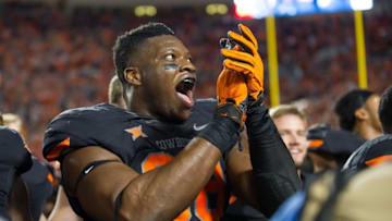 Nov 7, 2015; Stillwater, OK, USA; Oklahoma State Cowboys defensive end Emmanuel Ogbah (38) celebrates after the game against the TCU Horned Frogs at Boone Pickens Stadium. OSU won 49-29. Mandatory Credit: Rob Ferguson-USA TODAY Sports