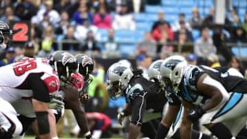 Nov 16, 2014; Charlotte, NC, USA; The Falcons and the Pantehrs at the line of scrimmage in the first quarter at Bank of America Stadium. Mandatory Credit: Bob Donnan-USA TODAY Sports