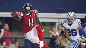 Sep 27, 2015; Arlington, TX, USA; Atlanta Falcons receiver Julio Jones (11) dives for the pylon to score a touchdown in the third quarter against Dallas Cowboys cornerback Tyler Patmon (26) at AT&T Stadium. Mandatory Credit: Matthew Emmons-USA TODAY Sports