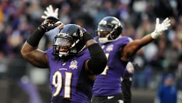 Nov 22, 2015; Baltimore, MD, USA; Baltimore Ravens linebacker Courtney Upshaw (91) celebrates in the fourth quarter against the St. Louis Rams at M&T Bank Stadium. Mandatory Credit: Evan Habeeb-USA TODAY Sports