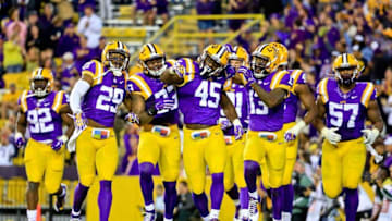 Oct 3, 2015; Baton Rouge, LA, USA; LSU Tigers linebacker Deion Jones (45) celebrates with teammates following an interception against the Eastern Michigan Eagles during the second half of a game at Tiger Stadium. LSU defeated Eastern Michigan 44-22. Mandatory Credit: Derick E. Hingle-USA TODAY Sports