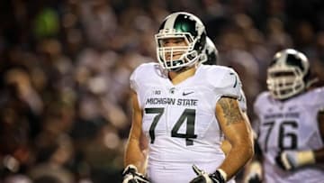 Sep 4, 2015; Kalamazoo, MI, USA; Michigan State Spartans offensive tackle Jack Conklin (74) walks off the field during the 1st half of a game against the Western Michigan Broncos at Waldo Stadium. Mandatory Credit: Mike Carter-USA TODAY Sports