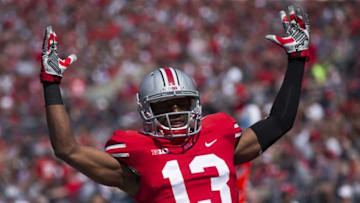 Apr 12, 2014; Columbus, OH, USA; Ohio State scarlet team cornerback Eli Apple (13) celebrates his squad