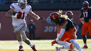Nov 14, 2015; Champaign, IL, USA; Ohio State Buckeyes tight end Nick Vannett (81) makes a catch against Illinois Fighting Illini defensive back Taylor Barton (3) during the fourth quarter at Memorial Stadium. Ohio State defats Illinois 28-3. Mandatory Credit: Mike DiNovo-USA TODAY Sports