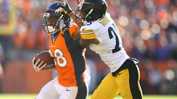 Jan 17, 2016; Denver, CO, USA; Denver Broncos wide receiver Demaryius Thomas (88) stiff arms Pittsburgh Steelers defensive back Brandon Boykin (25) during the first quarter of the AFC Divisional round playoff game at Sports Authority Field at Mile High. Mandatory Credit: Mark J. Rebilas-USA TODAY Sports