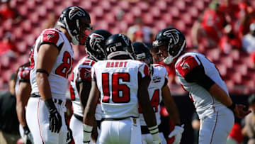 Dec 6, 2015; Tampa, FL, USA; Atlanta Falcons quarterback Matt Ryan (2) huddles up with wide receiver Justin Hardy (16) and teammates prior to the game at Raymond James Stadium. Mandatory Credit: Kim Klement-USA TODAY Sports