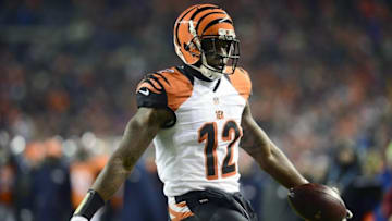 Dec 28, 2015; Denver, CO, USA; Cincinnati Bengals wide receiver Mohamed Sanu (12) carries for a touchdown in the second quarter against the Denver Broncos at Sports Authority Field at Mile High. Mandatory Credit: Ron Chenoy-USA TODAY Sports