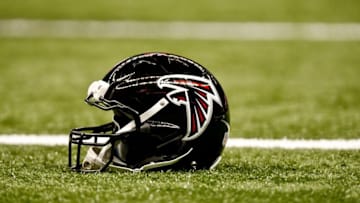 Dec 21, 2014; New Orleans, LA, USA; A Atlanta Falcons helmet rest on the field prior to the game against the New Orleans Saints at the Mercedes-Benz Superdome. Mandatory Credit: Derick E. Hingle-USA TODAY Sports