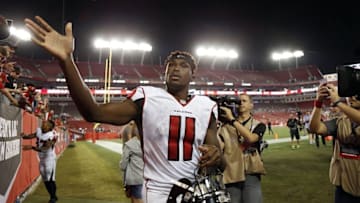 Nov 3, 2016; Tampa, FL, USA; Atlanta Falcons wide receiver Julio Jones (11) high fives fans after they beat the Tampa Bay Buccaneers at Raymond James Stadium. Atlanta Falcons defeated the Tampa Bay Buccaneers 43-28. Mandatory Credit: Kim Klement-USA TODAY Sports