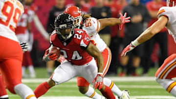 Dec 4, 2016; Atlanta, GA, USA; Atlanta Falcons running back Devonta Freeman (24) carries the ball against the Kansas City Chiefs during the first quarter at the Georgia Dome. Mandatory Credit: Dale Zanine-USA TODAY Sports