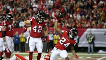 Dec 4, 2016; Atlanta, GA, USA; Atlanta Falcons running back Devonta Freeman (24) celebrates after scoring a touchdown in the first quarter of their game against the Kansas City Chiefs at the Georgia Dome. Mandatory Credit: Jason Getz-USA TODAY Sports