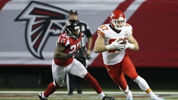 Dec 4, 2016; Atlanta, GA, USA; Kansas City Chiefs tight end Travis Kelce (87) carries the ball in front of Atlanta Falcons strong safety Keanu Neal (22) in the fourth quarter at the Georgia Dome. The Chiefs won 29-28. Mandatory Credit: Jason Getz-USA TODAY Sports