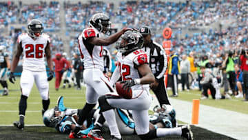 Dec 24, 2016; Charlotte, NC, USA; Atlanta Falcons wide receiver Nick Williams (15) celebrates with tight end Josh Perkins (82) after a touchdown reception in the first quarter against the Carolina Panthers at Bank of America Stadium. Mandatory Credit: Jeremy Brevard-USA TODAY Sports