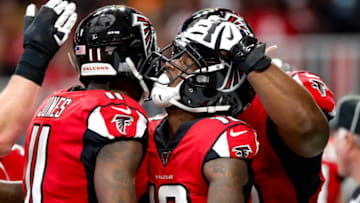 ATLANTA, GA - DECEMBER 08: Calvin Ridley #18 of the Atlanta Falcons reacts with teammates after a touchdown in the first half on an NFL game against the Carolina Panthers at Mercedes-Benz Stadium on December 8, 2019 in Atlanta, Georgia. (Photo by Todd Kirkland/Getty Images)