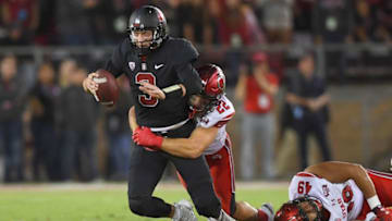 PALO ALTO, CA - OCTOBER 06: K.J. Costello #3 of the Stanford Cardinal gets sacked by Chase Hansen #22 of the Utah Utes during the first quarter of their NCAA football game at Stanford Stadium on October 6, 2018 in Palo Alto, California. (Photo by Thearon W. Henderson/Getty Images)