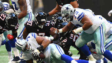 ATLANTA, GA - NOVEMBER 18: Lael Collins #71 of the Dallas Cowboys recovers a third quarter fumble against the Atlanta Falcons at Mercedes-Benz Stadium on November 18, 2018 in Atlanta, Georgia. (Photo by Scott Cunningham/Getty Images)