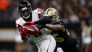 NEW ORLEANS, LOUISIANA - NOVEMBER 22: Julio Jones #11 of the Atlanta Falcons attempts to catch the ball as Eli Apple #25 of the New Orleans Saints defends during the second half at the Mercedes-Benz Superdome on November 22, 2018 in New Orleans, Louisiana. (Photo by Sean Gardner/Getty Images)