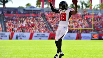 TAMPA, FLORIDA - DECEMBER 30: Calvin Ridley #18 of the Atlanta Falcons celebrates as he runs into the endzone to score during the fourth quarter against the Tampa Bay Buccaneers at Raymond James Stadium on December 30, 2018 in Tampa, Florida. The Falcons won 34-32. (Photo by Julio Aguilar/Getty Images)