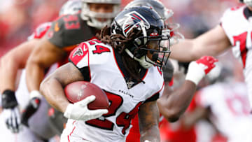 TAMPA, FLORIDA - DECEMBER 29: Devonta Freeman #24 of the Atlanta Falcons in action against the Tampa Bay Buccaneers during the first half at Raymond James Stadium on December 29, 2019 in Tampa, Florida. (Photo by Michael Reaves/Getty Images)